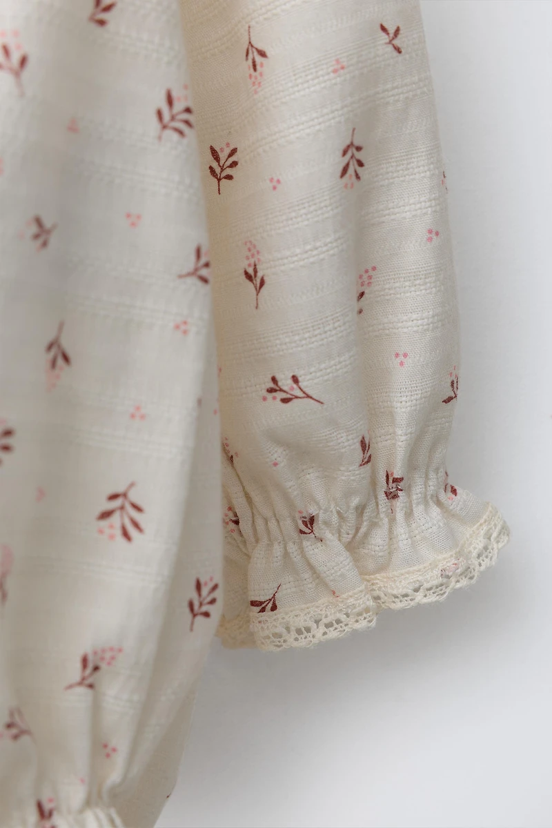 LACE TRIM FLORAL BODYSUIT