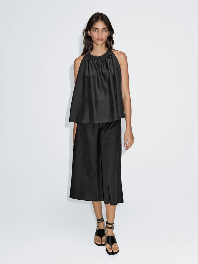 Jupe midi taille marquée
