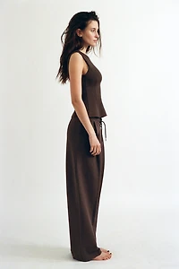 PEPLUM INTERLOCK TOP