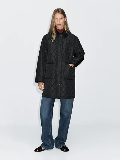 Long lightweight puffer jacket with corduroy detail