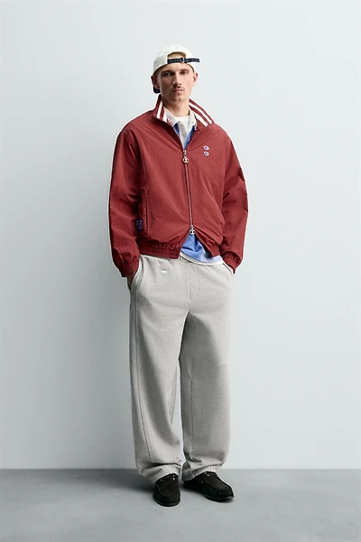 CHAMPION® X ZARA TECHNICAL PATCH JACKET