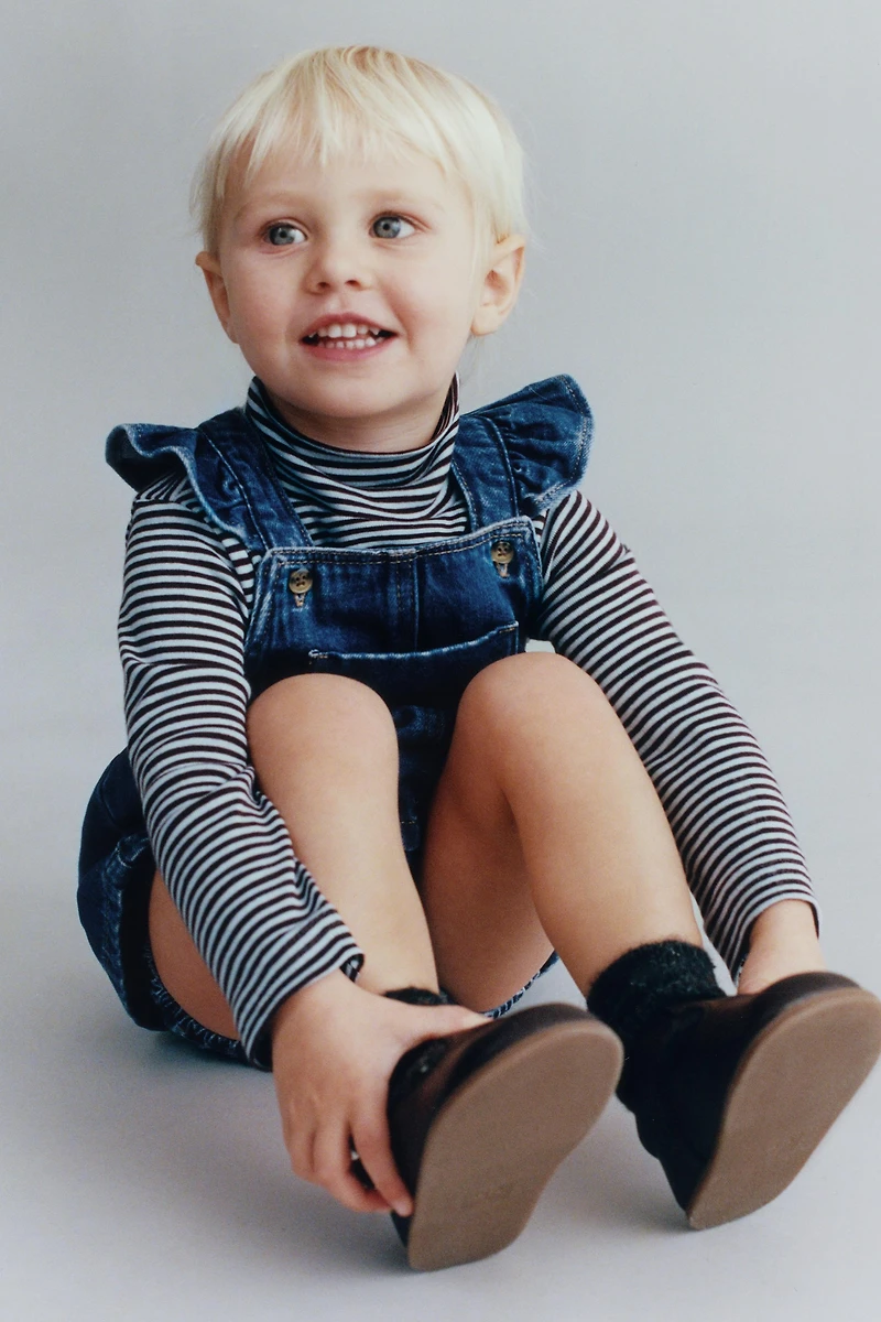 RUFFLE DENIM PINAFORE DRESS AND SHORTS