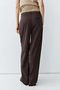 Cotton blend poplin pleated pants