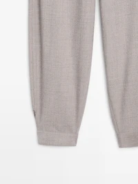 Wool blend trousers with buckle detail