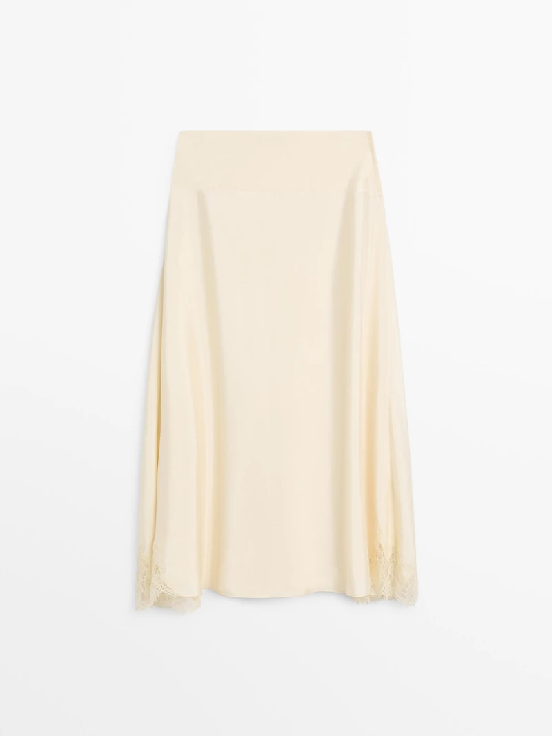 Asymmetric skirt with lace-trimmed detail