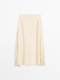 Asymmetric skirt with lace-trimmed detail