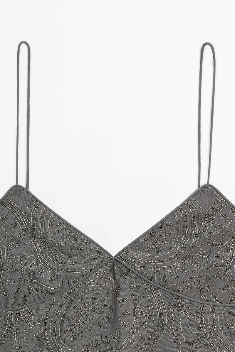 Strappy top with embroidered detail