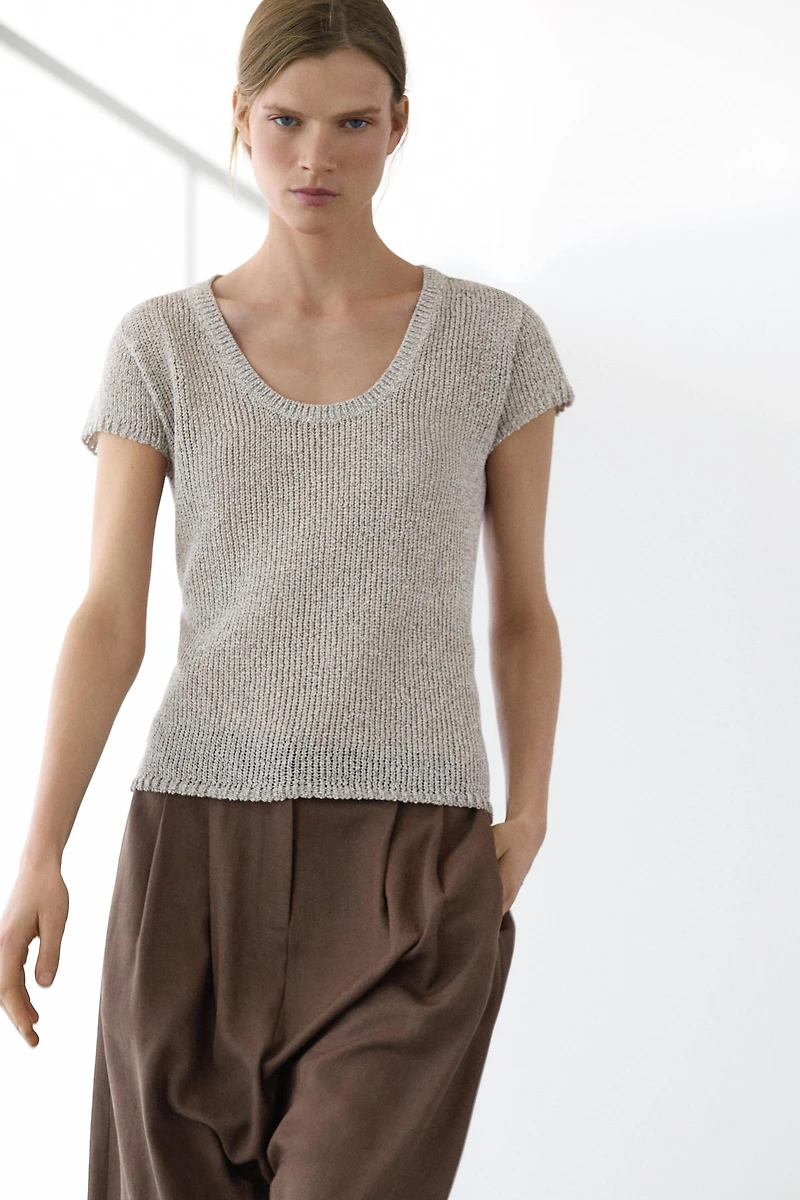 Pull manches courtes détail fil