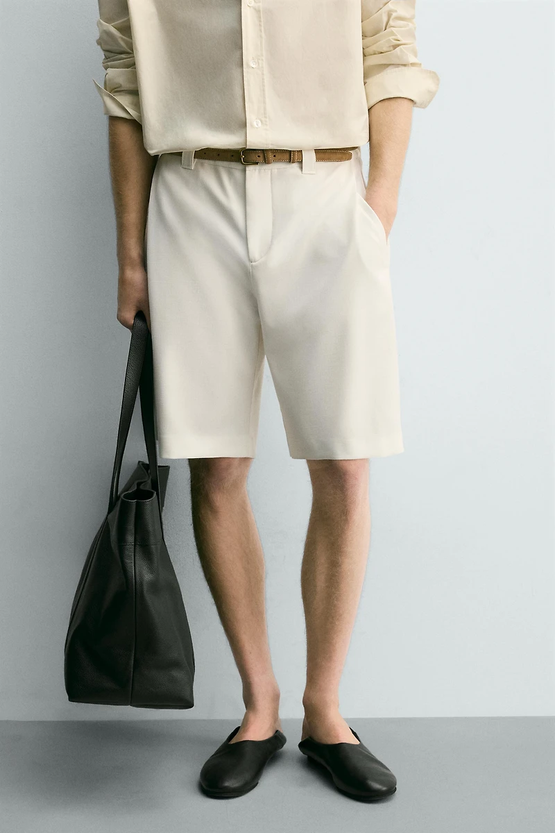 RELAXED FIT SIDE PLEAT SHORTS