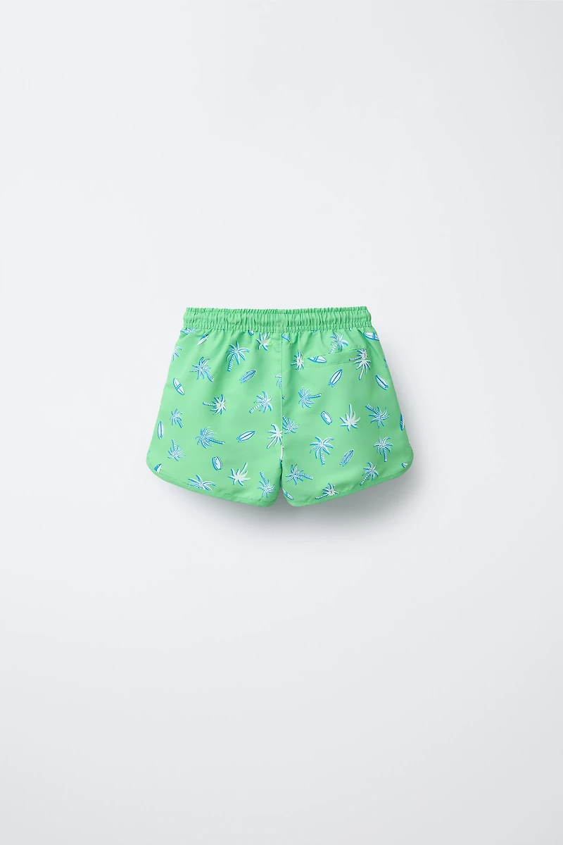 6-14 YEARS/ PALM TREE AND SURF SWIM SHORTS