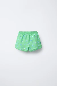 6-14 YEARS/ PALM TREE AND SURF SWIM SHORTS