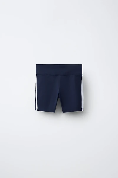 LEGGING CYCLISTE SPORTIF AVEC BANDES LATÉRALES