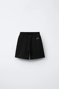 STRAIGHT FIT GARMENT DYE PLUSH SHORTS
