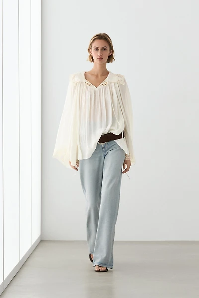 Embroidered flowing blouse