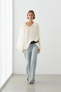 Embroidered flowing blouse