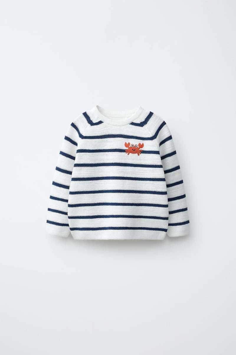 PULL EN MAILLE PERLÉE RAYURES CRABE BRODÉ