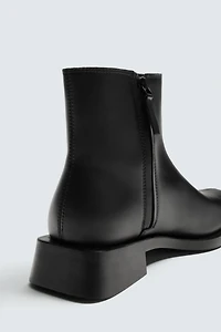 TOPSTITCHED MID-CALF BOOTS