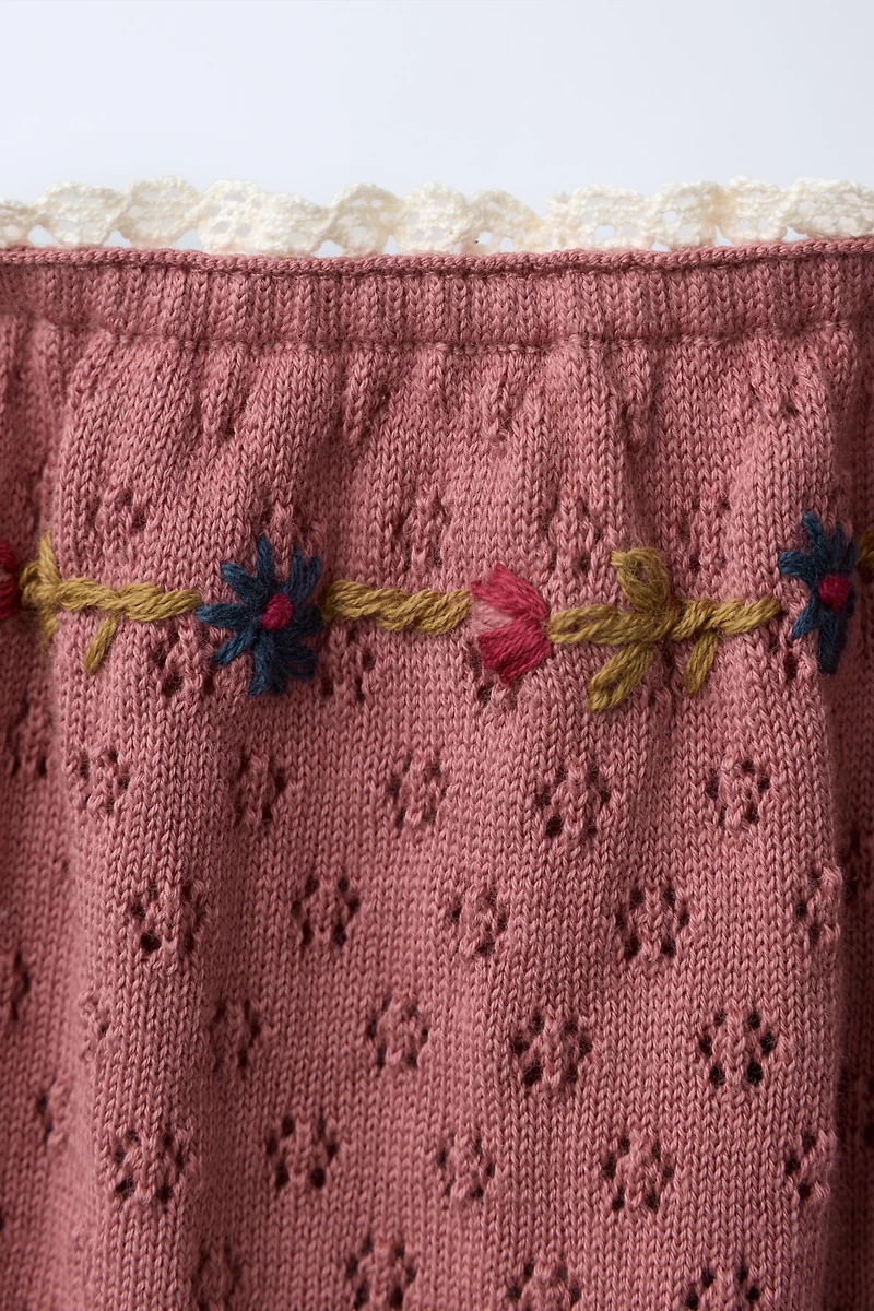KNIT DRESS WITH EMBROIDERED FLOWERS AND LACE TRIM