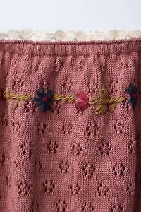 KNIT DRESS WITH EMBROIDERED FLOWERS AND LACE TRIM