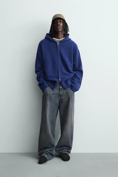 GILET EN MAILLE À CAPUCHE