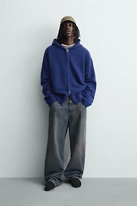 GILET EN MAILLE À CAPUCHE
