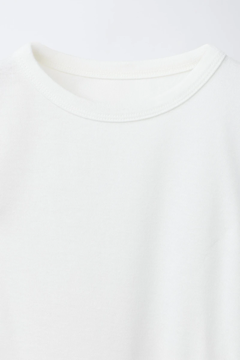 HAUT EN MODAL AVEC CUT OUT ET LACETS