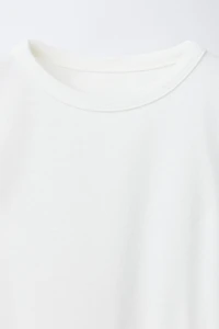 HAUT EN MODAL AVEC CUT OUT ET LACETS