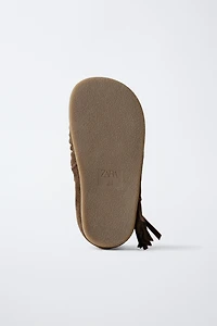 FRINGED LEATHER BOOTS