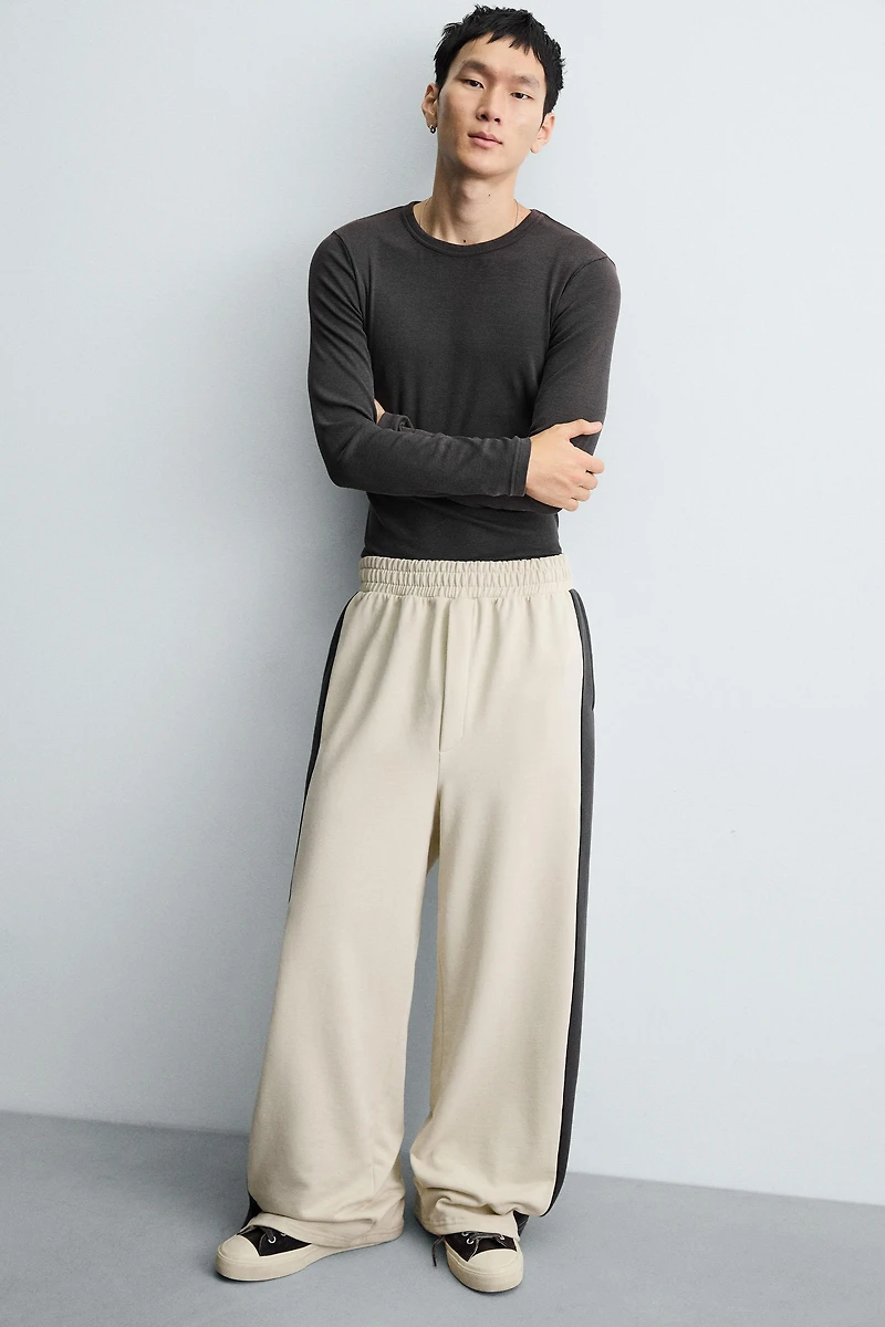 WIDE FIT JOGGER PANTS WITH STRIPES