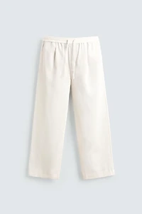 TEXTURED PLEATED PANTS