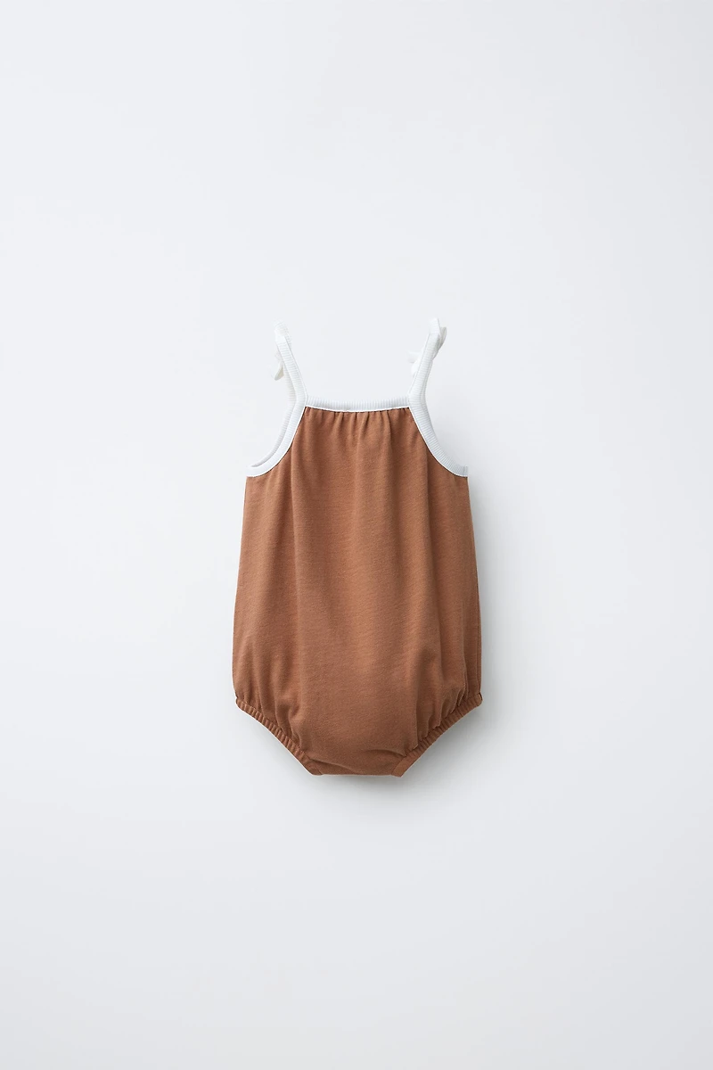 CONTRAST PIPING ROMPER