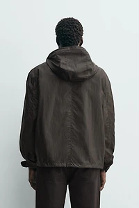 HOODED TECHNICAL JACKET