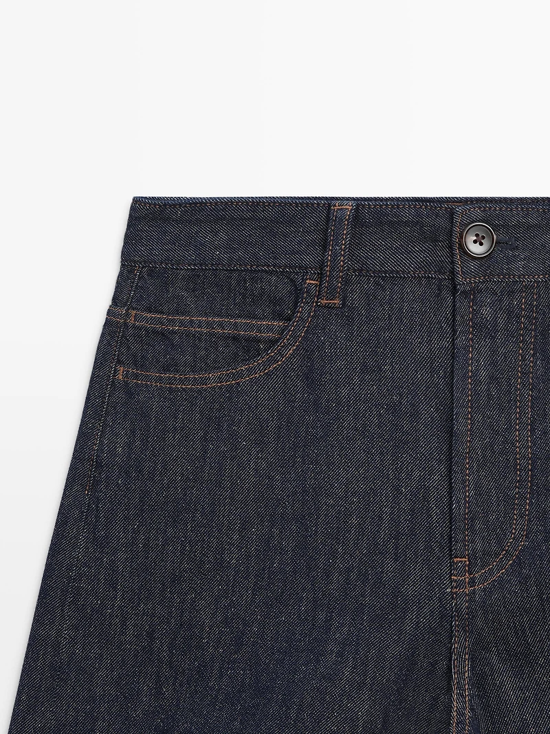 Total look mid-rise denim Bermuda shorts