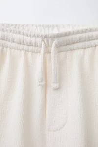 SLIM FIT TEXTURED TOWEL SHORTS