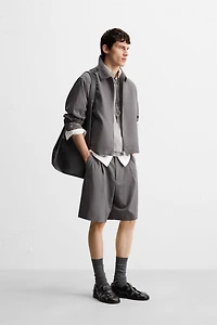 PLEATED RELAXED FIT SHORTS