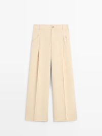 Wide-leg linen trousers with pocket detail