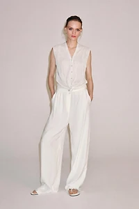 GILET EN MAILLE À NŒUD