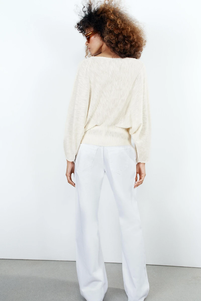 PULL EN MAILLE À MANCHES AMPLES
