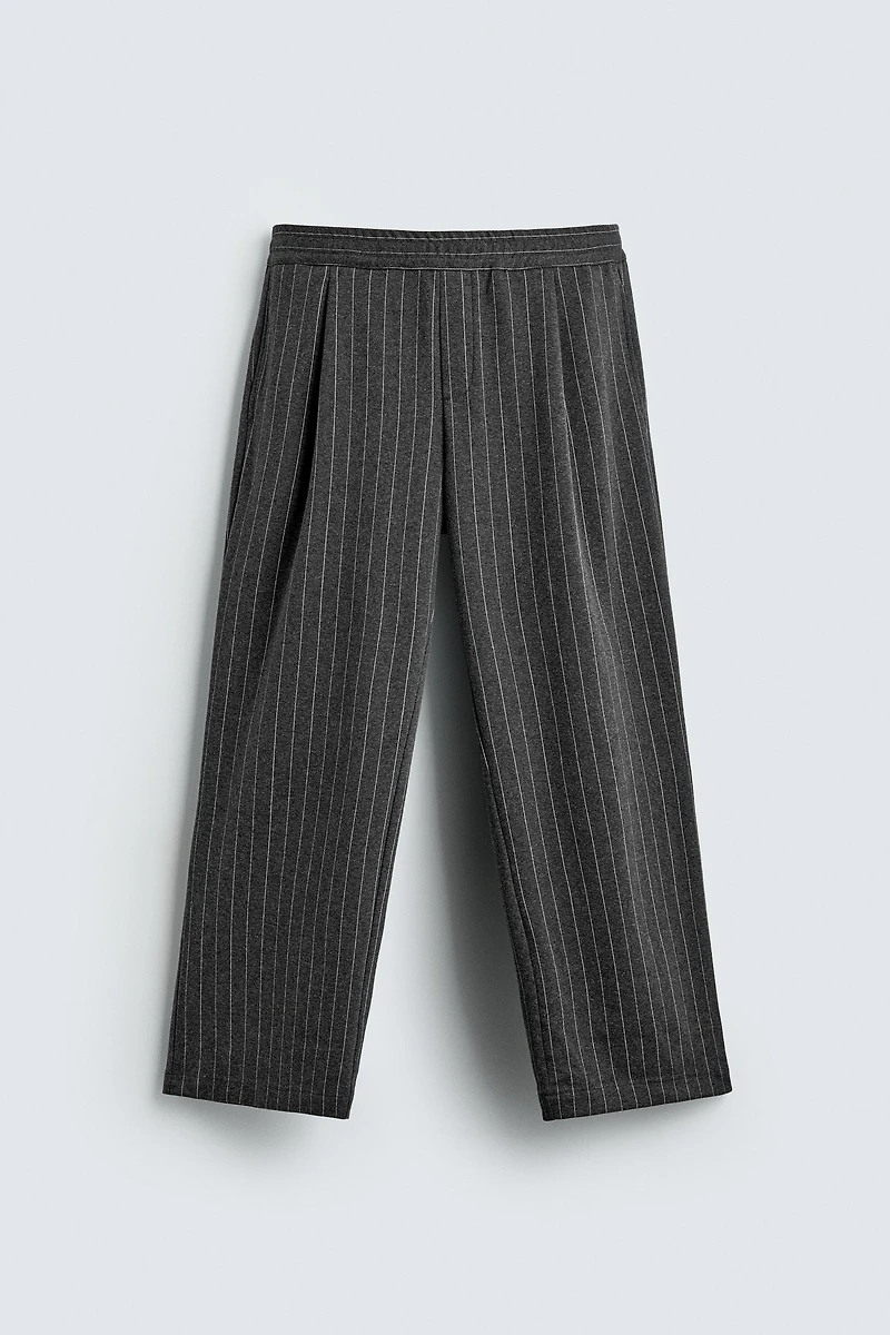 PANTALON À RAYURES TENNIS ET PLIS