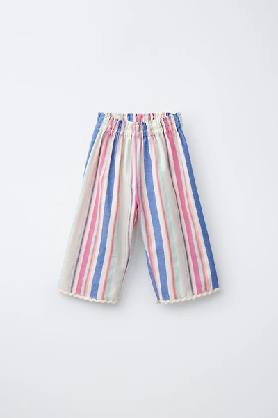 PANTALON À JAMBES LARGES RAYURES ET DENTELLE