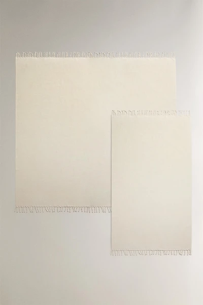 COTTON BEACH TOWEL WITH FRINGE