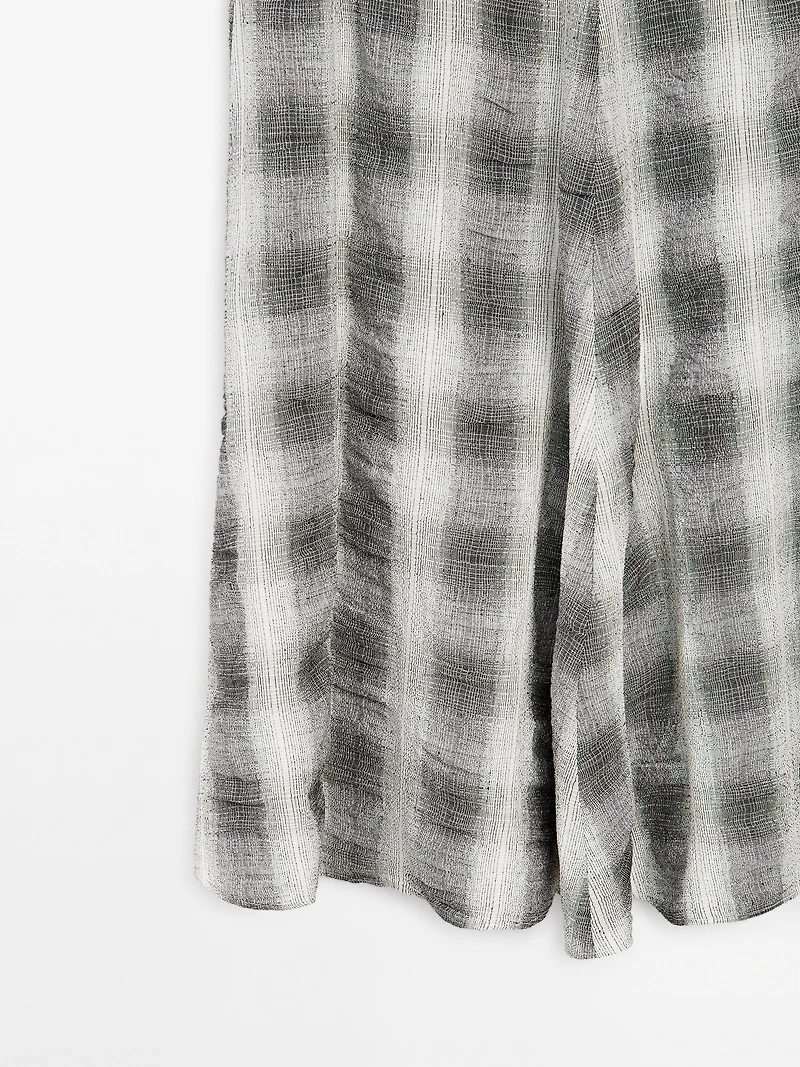 Long flared check skirt