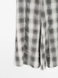 Long flared check skirt