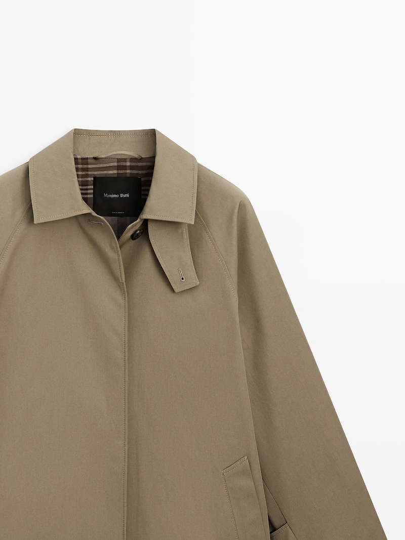 Oversize trench coat with check lining