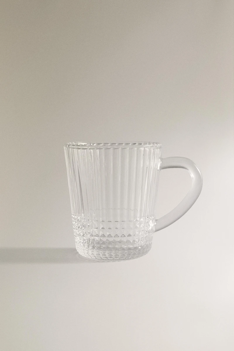 GLASS MUG WITH A RAISED GEOMETRIC DESIGN