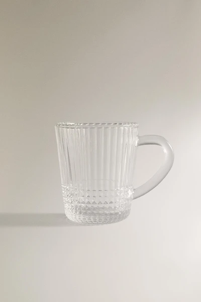 GLASS MUG WITH A RAISED GEOMETRIC DESIGN