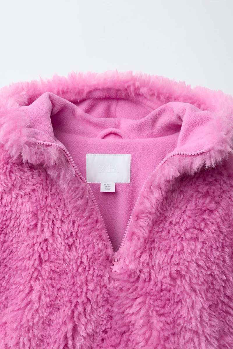 VESTE EFFET FOURRURE À CAPUCHE