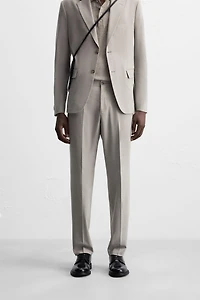 TEXTURED SUIT PANTS