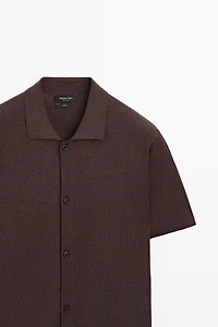 Short sleeve button-up knit cardigan