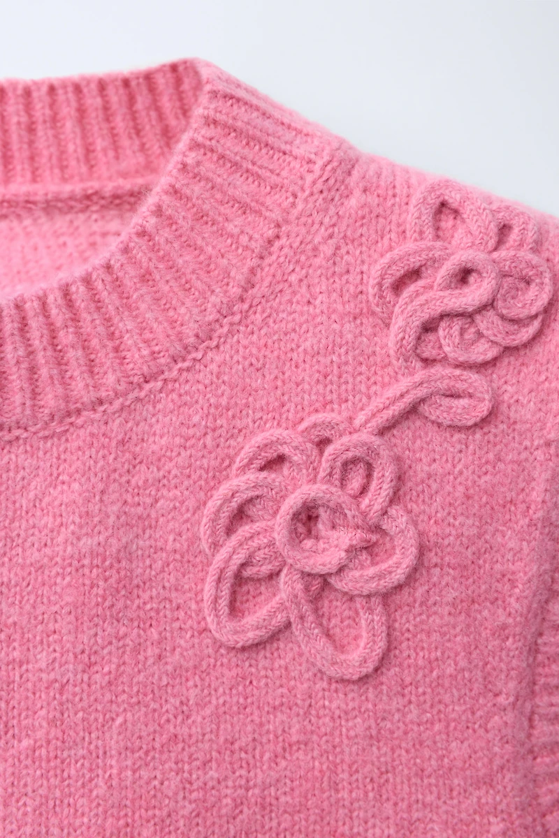 GILET EN MAILLE À FLEURS